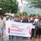 Foto : Massa Koalisi Masyarakat Tapanuli Tengah yang turun kejalan menuntut Pj Bupati Tapanuli Tengah turun dari jabatannya