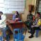 Keterangan Foto: Babinsa Koramil 06/Kota, Kopda Sapran Pasaribu berkoordinasi dengan Bhabinkamtibmas, Kepling dan warga, di Kantor Kelurahan Aek Parombunan, Kota Sibolga.