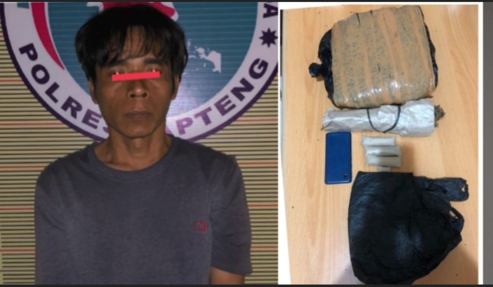 Foto : Terduga Bandar Narkoba (MAN) bersama barang bukti saat diamankan di Polres Tapteng