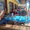 Keterangan Foto: Babinsa Koramil 06/Kota, Serda Rivai Manurung melaksanakan kegiatan Komsos dengan warga membahas perihal Kenakalan Remaja, di salah satu warung di Kelurahan Pancuran Dewa, Kota Sibolga.