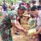 Keterangan Foto: Babinsa Koramil 05/Kolang, Serda Khaidir Nainggolan mendampingi Nakes melaksanakan pelayanan kesehatan buat Balita dan Lansia. Bertempat di Desa Tapian Nauli IV, Kabupaten Tapteng, Kamis (20/07/2023).