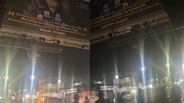Foto : sejumlah Satpol PP Kota Sibolga berada dilokasi reklame untuk menurunkan Baliho Ketua DPD KNPI Kota Sibolga, Imam Faesal pada Selasa (1/8/23).