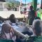 Foto : Babinsa Koramil 03/Pandan, Serda CB Hutabarat saat mendampingi giat Posyandu di Kelurahan Lubuk Tukko Induk, Kecamatan Pandan pada Senin (21/8/23).