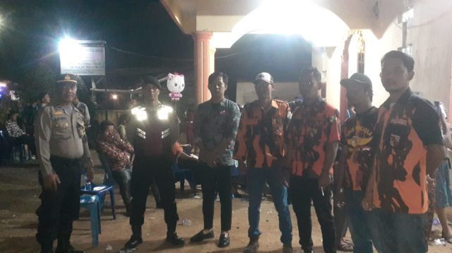 Foto : PAC Pemuda Pancasila Kecamatan Pandan foto bersama saat melakukan pengamanan ibadah Natal tahun 2023 di Kota Pandan