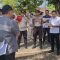 Foto : Panitera PN Sibolga didampingi Irsan Tambuna membacakan surat perintah Konstatering dan sita eksekusi lahan